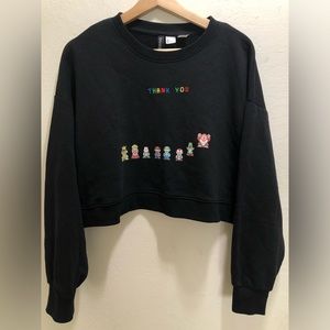 Divided black long sleeve short blouse to the waist, by Mario bro of Nintendo